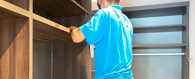 Move-In Cleaning Services in Singapore vs. DIY - Which Is Better, Superb Cleaning staff wiping a cabinet